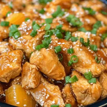 Crock Pot Mandarin Chicken taken with iphone 15 pro max --iw 2 --ar 4:5 --v 6.1 --raw