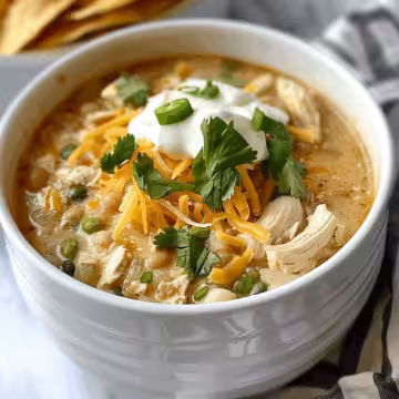 Crockpot White Chicken Chili Recipe taken with iphone 15 pro max --iw 2 --ar 4:5 --v 6.0 --raw