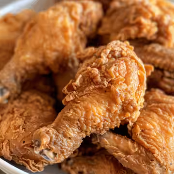 Easy Fried Chicken taken with iphone 15 pro max --iw 2 --ar 4:5 --v 6.0 --raw