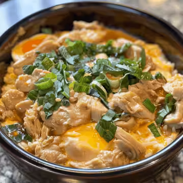 Oyakodon in Rice Cooker (One-Pot Japanese Chicken & Egg Bowl) taken with iphone 15 pro max --iw 2 --ar 4:5 --v 6.0 --raw