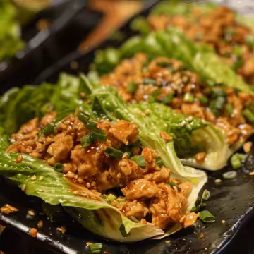 Pf Chang's Chicken Lettuce Wraps taken with iphone 15 pro max --iw 2 --ar 4:5 --v 6.0 --raw