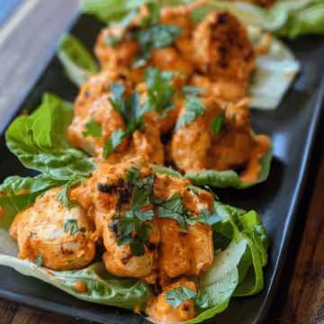 Red Curry Chicken Rissole Lettuce Cups taken with iphone 15 pro max --iw 2 --ar 4:5 --v 6.0 --raw