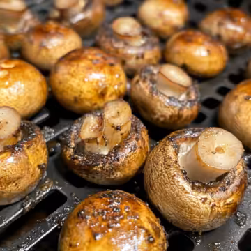 Air Fryer Mushrooms taken with iphone 15 pro max --iw 2 --ar 4:5 --v 6.1 --raw