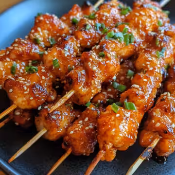 Bang Bang Chicken Skewers taken with iphone 15 pro max --iw 2 --ar 4:5 --v 6.1 --raw