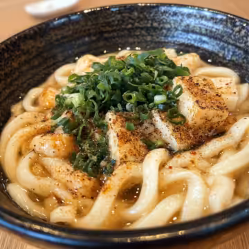 Black Pepper Udon taken with iphone 15 pro max --iw 2 --ar 4:5 --v 6.1 --raw