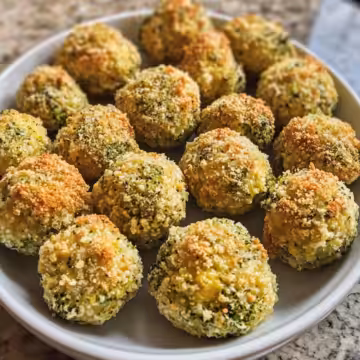 Broccoli Cheese Balls taken with iphone 15 pro max --iw 2 --ar 4:5 --v 6.1 --raw