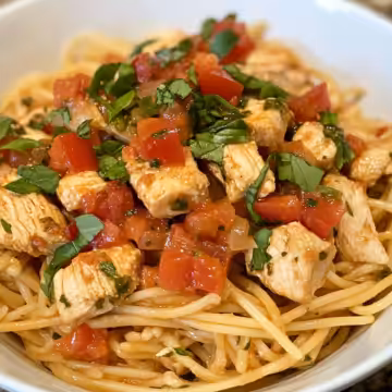 Bruschetta Chicken Pasta taken with iphone 15 pro max --iw 2 --ar 4:5 --v 6.1 --raw