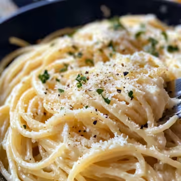 Cheesy Garlic Parmesan Spaghetti And Cream Cheese taken with iphone 15 pro max --iw 2 --ar 4:5 --v 6.1 --raw