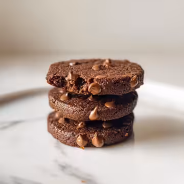 Chickpea Chocolate Cookies taken with iphone 15 pro max --iw 2 --ar 4:5 --v 6.1 --raw