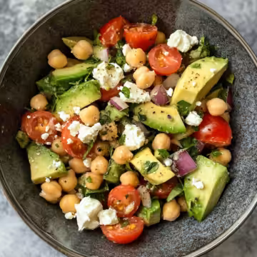 Chickpea Feta Avocado Salad taken with iphone 15 pro max --iw 2 --ar 4:5 --v 6.1 --raw