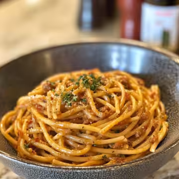 Copycat Carbone’s Spicy Pasta Recipe taken with iphone 15 pro max --iw 2 --ar 4:5 --v 6.1 --raw