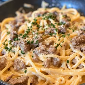 Creamy Beef and Garlic Butter Pasta Recipe taken with iphone 15 pro max --iw 2 --ar 4:5 --v 6.1 --raw