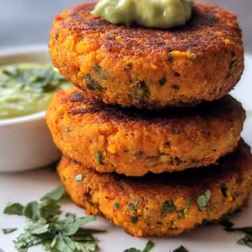 Crispy Sweet Potato Red Lentil Patties Avocado Sauce taken with iphone 15 pro max --iw 2 --ar 4:5 --v 6.1 --raw