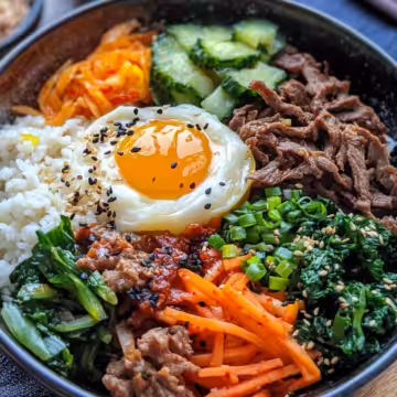 Delicious Korean Beef Bibimbap Bowl Recipe Youll Love taken with iphone 15 pro max --iw 2 --ar 4:5 --v 6.1 --raw