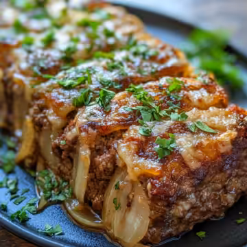 French Onion Meatloaf taken with iphone 15 pro max --iw 2 --ar 4:5 --v 6.1 --raw