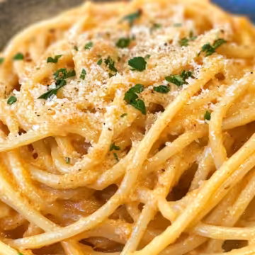 Garlic Parmesan Cajun Spaghetti taken with iphone 15 pro max --iw 2 --ar 4:5 --v 6.1 --raw