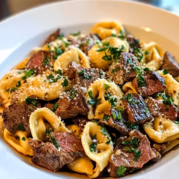 Garlic Steak Tortellini Recipe taken with iphone 15 pro max --iw 2 --ar 4:5 --v 6.1 --raw
