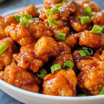 Hot Orange Chicken Panda Express Copycat A Fiery Feast Made Easy taken with iphone 15 pro max --iw 2 --ar 4:5 --v 6.1 --raw