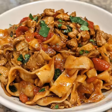 Italian Drunken Noodles Bold Spicy taken with iphone 15 pro max --iw 2 --ar 4:5 --v 6.1 --raw