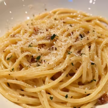 Midnight Pasta taken with iphone 15 pro max --iw 2 --ar 4:5 --v 6.1 --raw