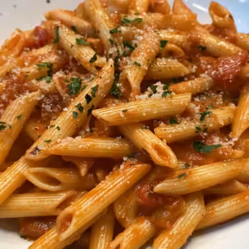Penne Arrabbiata With Chili Crisp taken with iphone 15 pro max --iw 2 --ar 4:5 --v 6.1 --raw