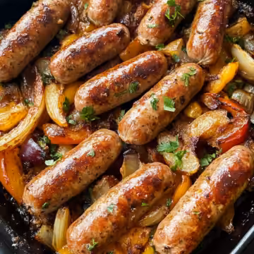 Quick Pork Sausage Tray Bake taken with iphone 15 pro max --iw 2 --ar 4:5 --v 6.1 --raw