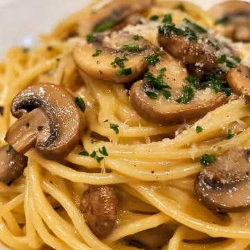 Recipe Mushroom And Garlic Spaghetti Dinner taken with iphone 15 pro max --iw 2 --ar 4:5 --v 6.1 --raw