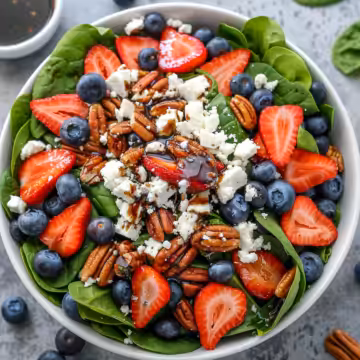 30-Minute Strawberry Spinach Salad with Blueberries, Pecans, Feta cheese, and a Balsamic glaze. taken with iphone 15 pro max --iw 2 --ar 4:5 --v 6.0 --raw