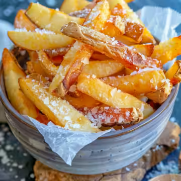 Air Fryer Apple Fries taken with iphone 15 pro max --iw 2 --ar 4:5 --v 6.0 --raw