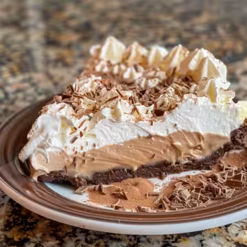 Baileys Chocolate Cream Pie taken with iphone 15 pro max --iw 2 --ar 4:5 --v 6.0 --raw