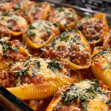 Beef-Stuffed Shells with Creamy Ricotta taken with iphone 15 pro max --iw 2 --ar 4:5 --v 6.0 --raw