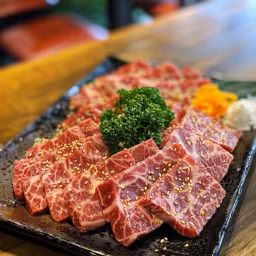 Beef Yakiniku taken with iphone 15 pro max --iw 2 --ar 4:5 --v 6.0 --raw