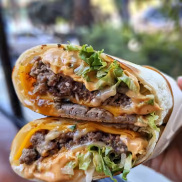 Big Mac Wraps taken with iphone 15 pro max --iw 2 --ar 4:5 --v 6.0 --raw