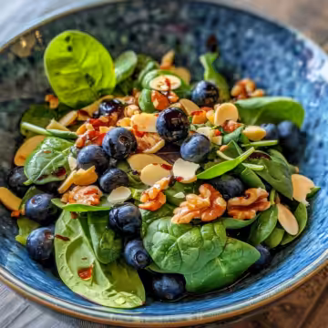 blueberry spinach salad with honey balsamic dressing - Blue Bowl taken with iphone 15 pro max --iw 2 --ar 4:5 --v 6.0 --raw