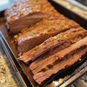 Braised Corned Beef Brisket taken with iphone 15 pro max --iw 2 --ar 4:5 --v 6.0 --raw