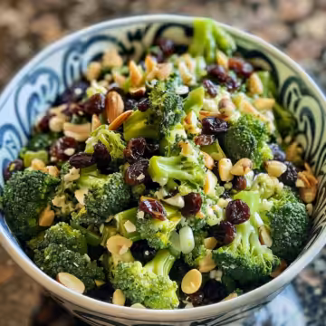 Broccoli Raisin Salad taken with iphone 15 pro max --iw 2 --ar 4:5 --v 6.0 --raw