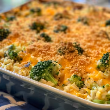 Broccoli Rice Casserole taken with iphone 15 pro max --iw 2 --ar 4:5 --v 6.0 --raw
