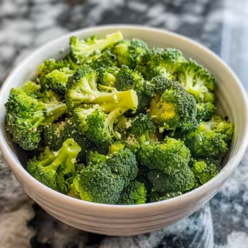 Broccoli Salad taken with iphone 15 pro max --iw 2 --ar 4:5 --v 6.0 --raw