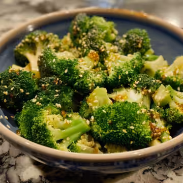 Broccoli Salad with Honey Dijon Dressing taken with iphone 15 pro max --iw 2 --ar 4:5 --v 6.0 --raw