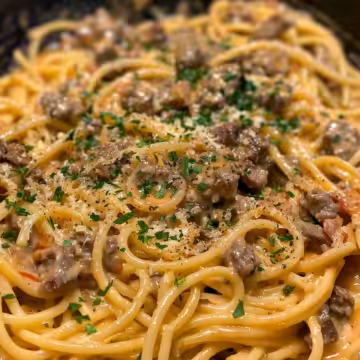 Cajun Beef Spaghetti in Creamy Parmesan Sauce taken with iphone 15 pro max --iw 2 --ar 4:5 --v 6.0 --raw