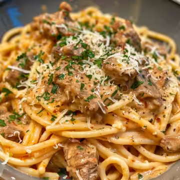 Cajun Beef Spaghetti in Creamy Parmesan Sauce taken with iphone 15 pro max --iw 2 --ar 4:5 --v 6.0 --raw