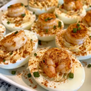 Cajun Shrimp Deviled Eggs taken with iphone 15 pro max --iw 2 --ar 4:5 --v 6.0 --raw