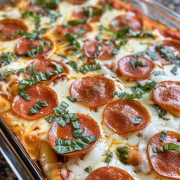Cheesy Zucchini Pizza Casserole taken with iphone 15 pro max --iw 2 --ar 4:5 --v 6.0 --raw