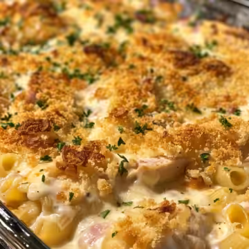Chicken Cordon Bleu Casserole taken with iphone 15 pro max --iw 2 --ar 4:5 --v 6.0 --raw
