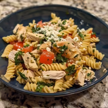 Chicken Feta Greek Pasta taken with iphone 15 pro max --iw 2 --ar 4:5 --v 6.0 --raw