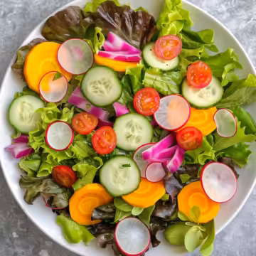 Colorful Spring Salad for Easter taken with iphone 15 pro max --iw 2 --ar 4:5 --v 6.0 --raw