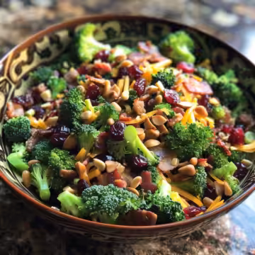 Cranberry Bacon Broccoli Salad taken with iphone 15 pro max --iw 2 --ar 4:5 --v 6.0 --raw
