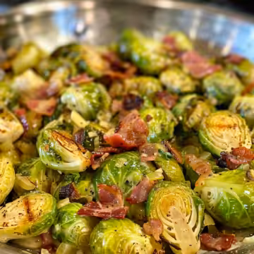 Creamy Brussels Sprouts with Bacon taken with iphone 15 pro max --iw 2 --ar 4:5 --v 6.0 --raw