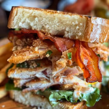 Crispy Chicken Caesar Sandwich taken with iphone 15 pro max --iw 2 --ar 4:5 --v 6.0 --raw