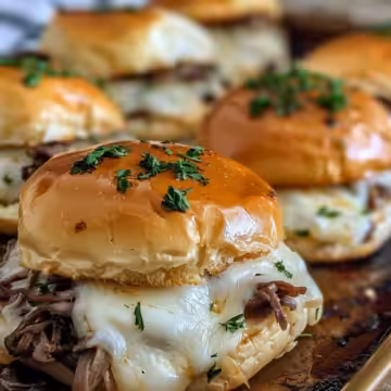 Easy French Dip Sliders taken with iphone 15 pro max --iw 2 --ar 4:5 --v 6.0 --raw